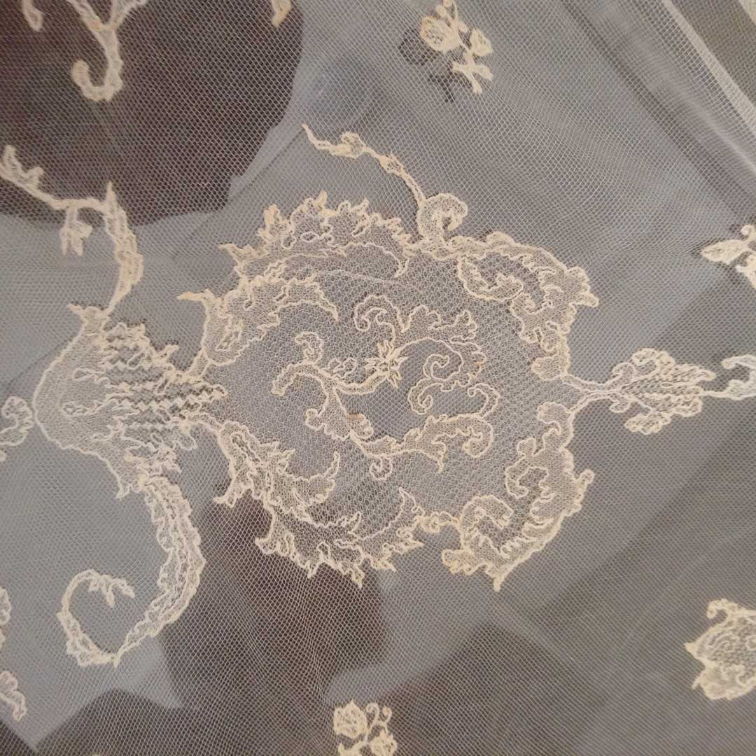 Large square cream coloured Limerick Lace veil